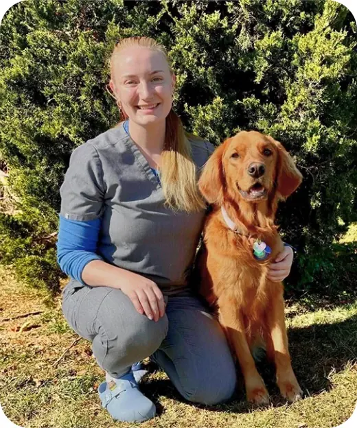 Dr. Kiebler with a golden retriever